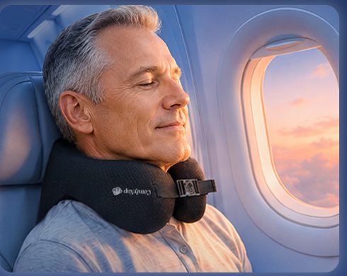 Traveler leaning back into the seat by the window